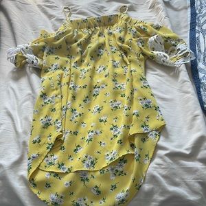 by & by
size medium 
bright yellow with flowers